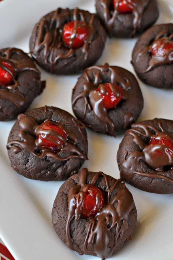 A soft fudge cookie with a plump, sweet maraschino cherry right in the center and then drizzled with a chocolate fudge sauce. 