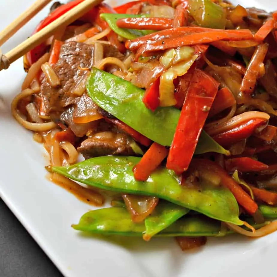 A delectably easy Beef Lo Mein stir fry recipe with onions, carrots, celery, red bell pepper, noodles and a savory sauce.