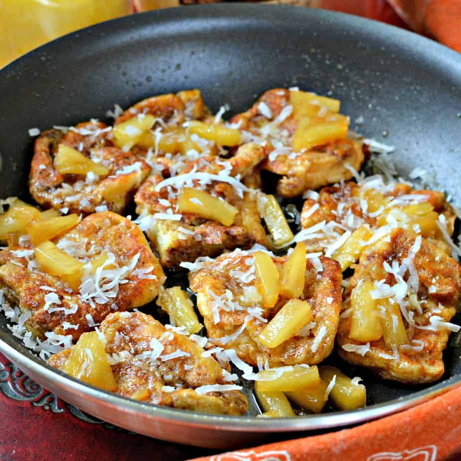 This King's Hawaiian French Toast is a delectable combination of King's sweet rolls, pineapple, and coconut. 