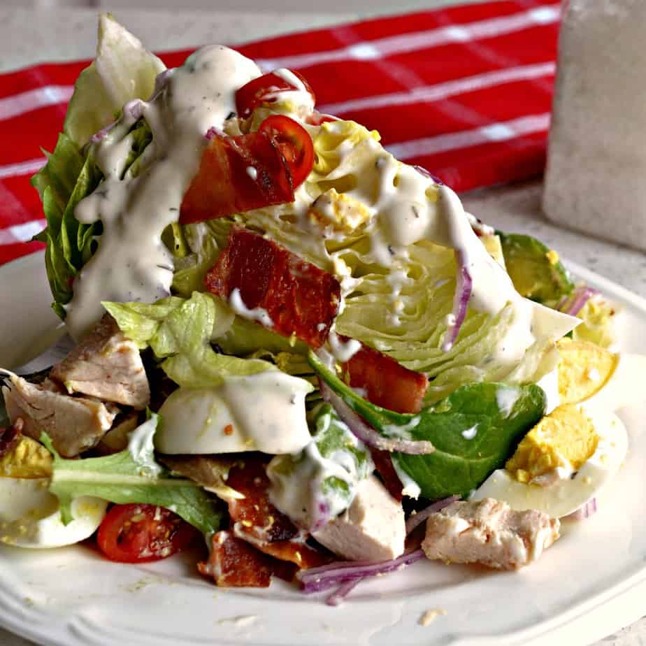 This unique wedge salad requires a knife and fork to cut off bite-sized pieces