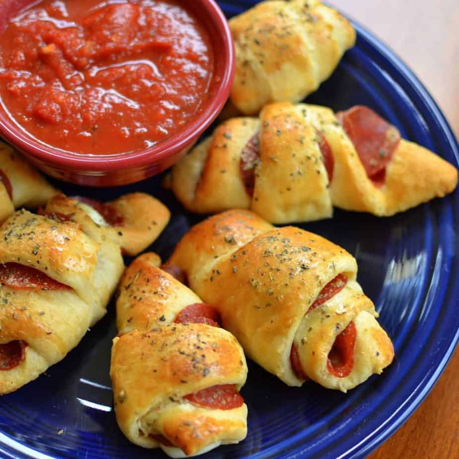 These super easy Pepperoni Crescent Rolls take just minutes to prepare using prepared refrigerated crescent roll dough.  They are kid-friendly and approved.