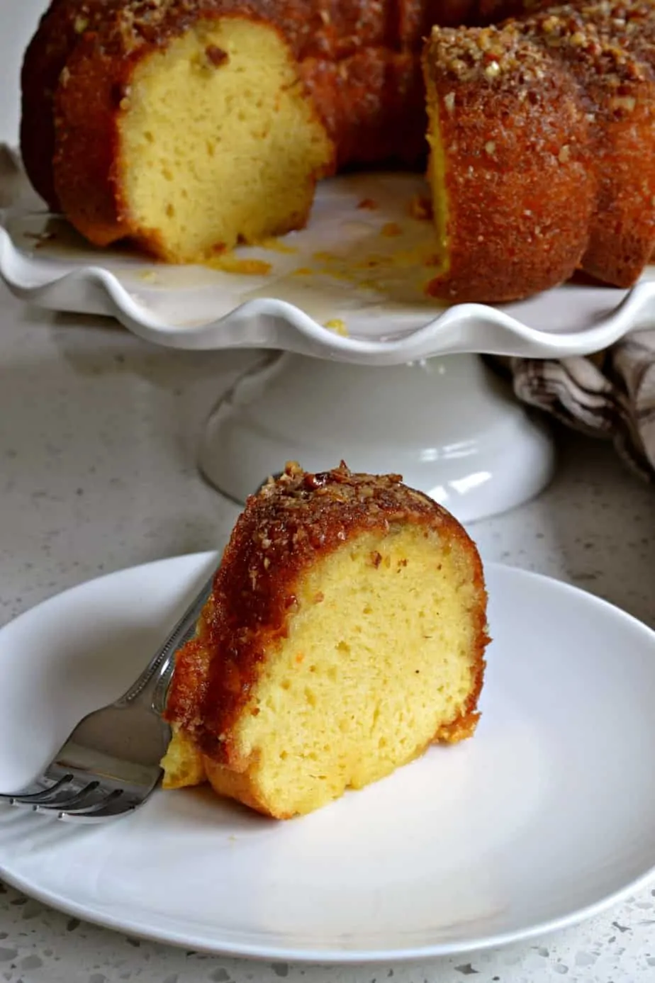 A moist easy Rum Cake with a butter rum glaze that comes together quickly using a yellow butter cake mix