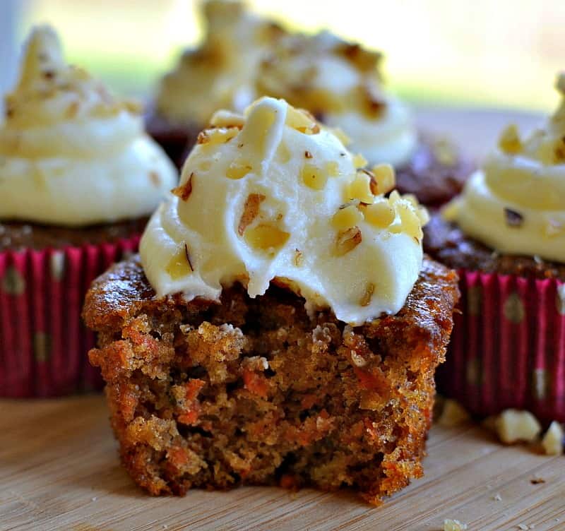 A family and friend favorite carrot cupcake recipe with crushed pineapple and chopped walnuts. 