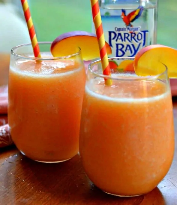 These cool and refreshing Peach Daiquiris are made with four easy ingredients int the blender in less than five minutes.