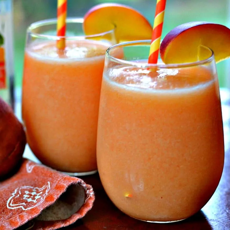 These delectable quick and easy fresh Peach Daiquiris will become your favorite refreshing summer cocktail.