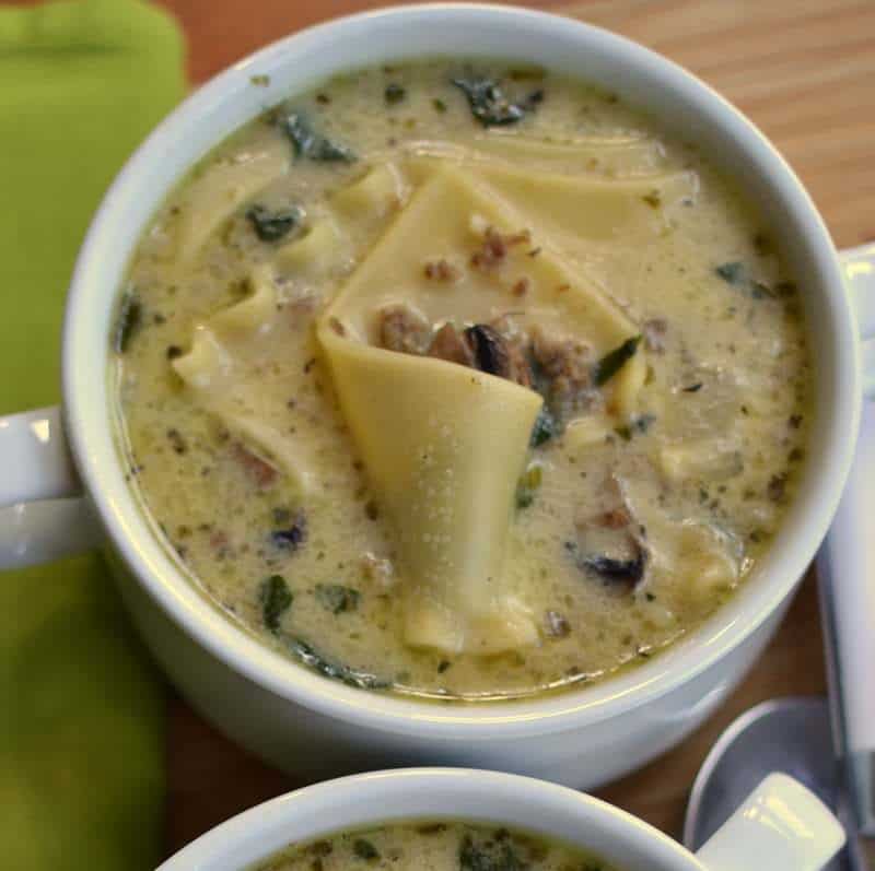 Creamy Alfredo Lasagna Soup is packed with mushrooms, spinach, and noodles all in a creamy parmesan broth