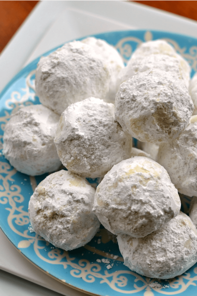 These melt in your mouth buttery pecan shortbread cookies are baked to perfection and rolled in powdered sugar.