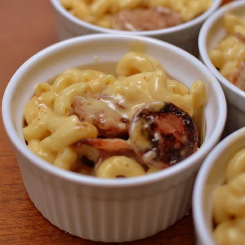 Extra creamy macaroni and cheese with tender chicken sausage and savory bacon mixed in