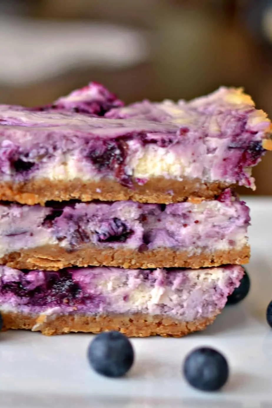 From-scratch blueberry cheesecake is layered on top of a classic graham cracker crust.