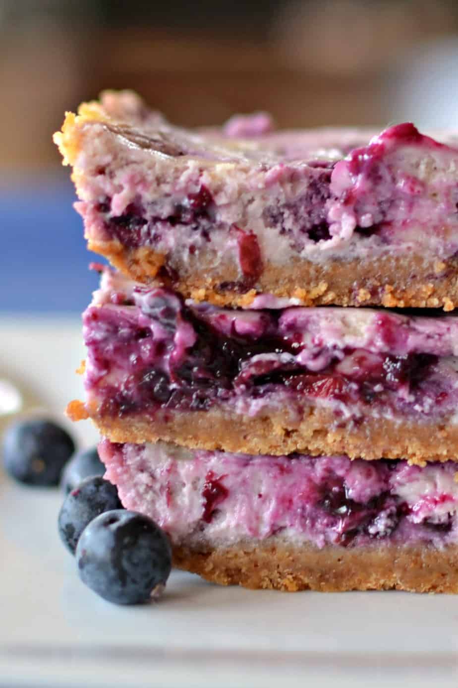 Three blueberry cream cheese bars stacked