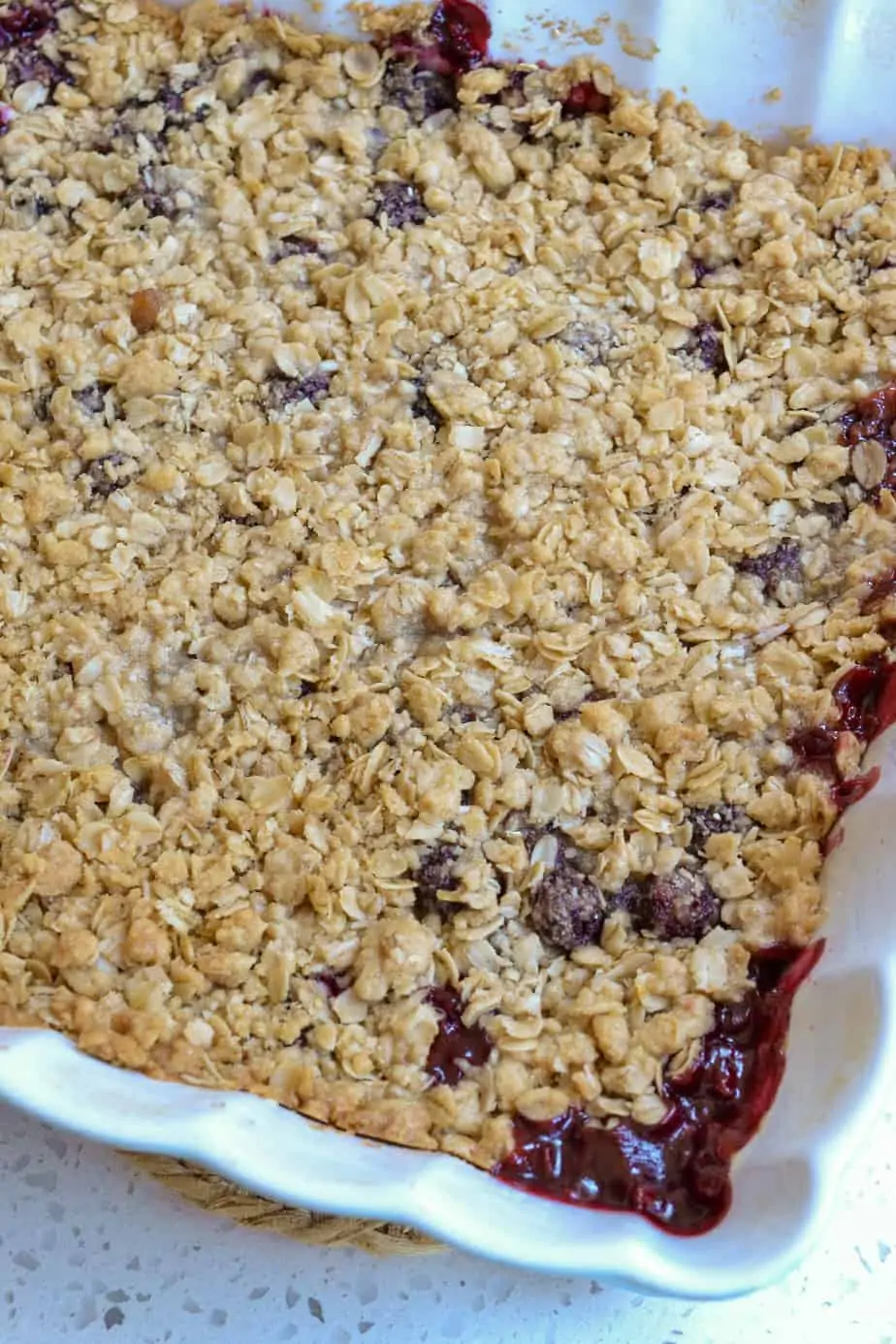 Straight out of the oven blackberry crisp with bubbly edges. 