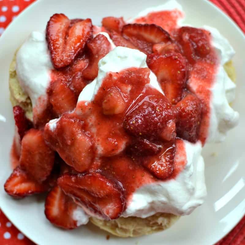 This sweet strawberry shortcake recipe is made with homemade biscuits topped with strawberries and fresh whipped cream