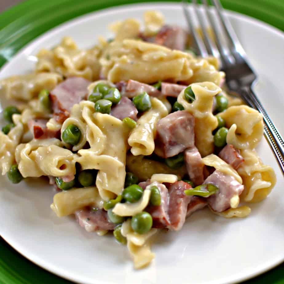 A family friendly one pot dinner combining campanelle, ham and peas in a creamy lightly seasoned rich cheese sauce.