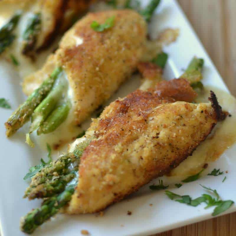 Tender chicken stuffed with parmesan cheese and wrapped around asparagus