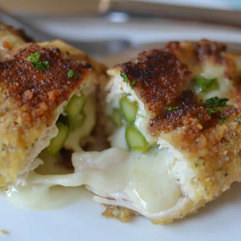 Crispy breaded chicken stuffed with tender asparagus and parmesan cheese is an easy,. delicious dinner