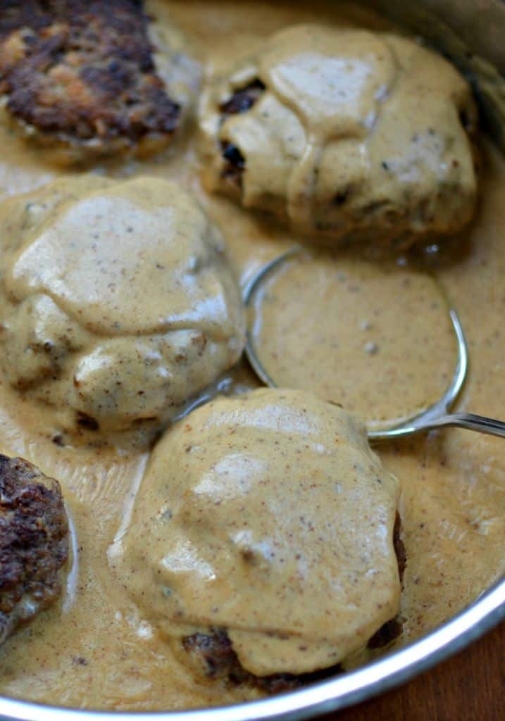 Hamburger Steaks with Country Gravy are a quick, inexpensive ground beef recipe that is prepared in one skillet.
