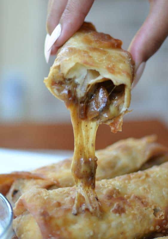These cheesy philly cheesesteak egg rolls are the perfect party appetizer
