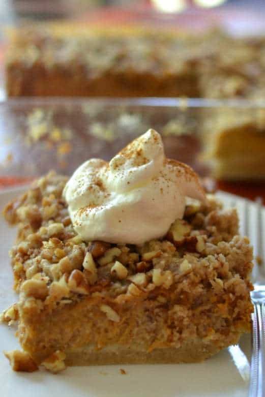 Crunchy Pecan Pumpkin Pie Bars are the perfect combination of the two most popular holiday pies - pumpkin and pecan!