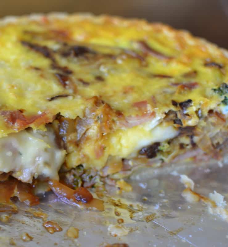 This creamy and savory breakfast quiche has caramelized onions, broccoli, ham, and creamy cheddar chese