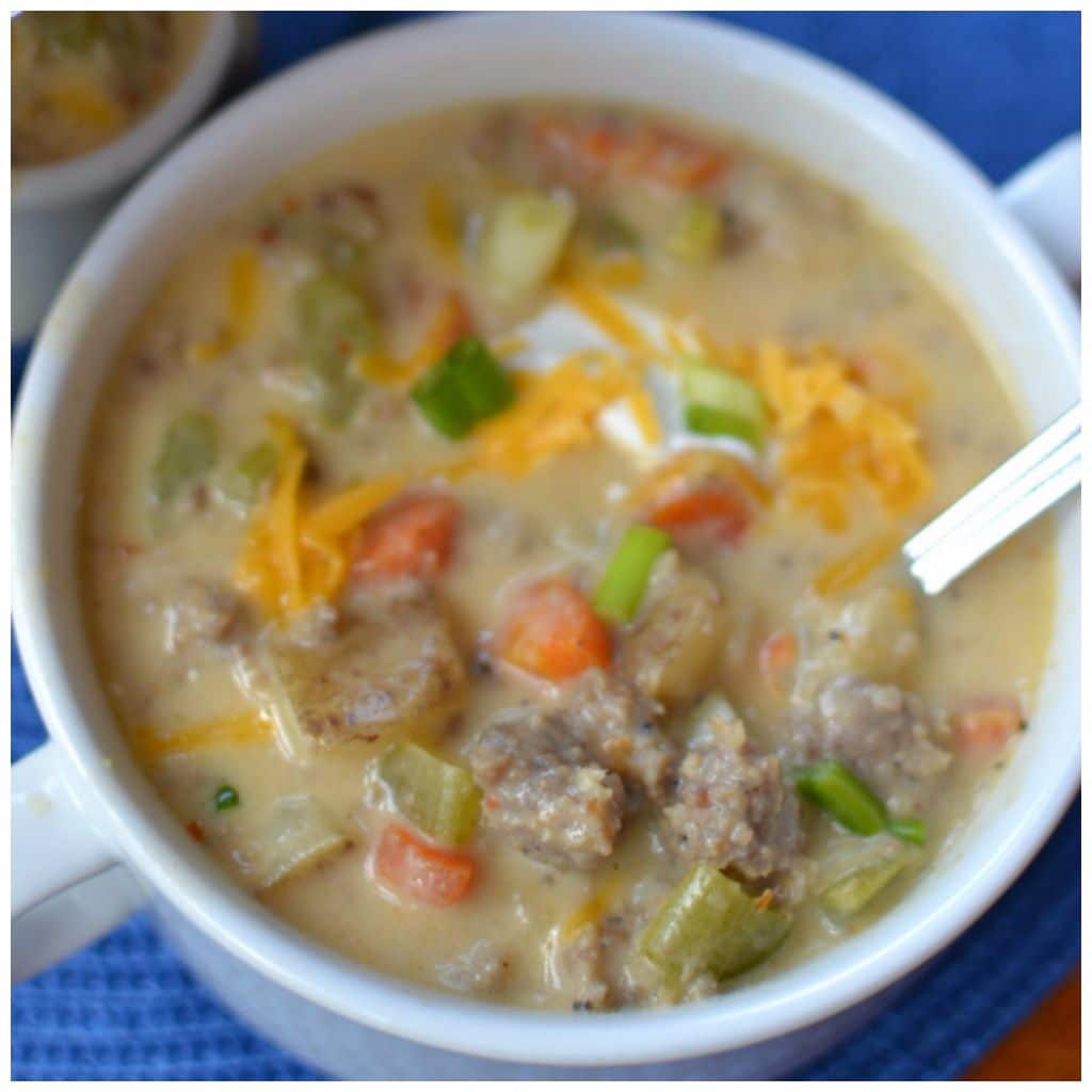 Tender veggies and potatoes, spiced sausage, and cheese make this hearty soup a warming, delicious meal
