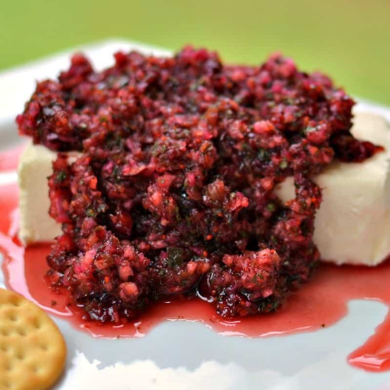 This fabulous cranberry salsa appetizer is a holiday favorite served over a brick of softened cream cheese