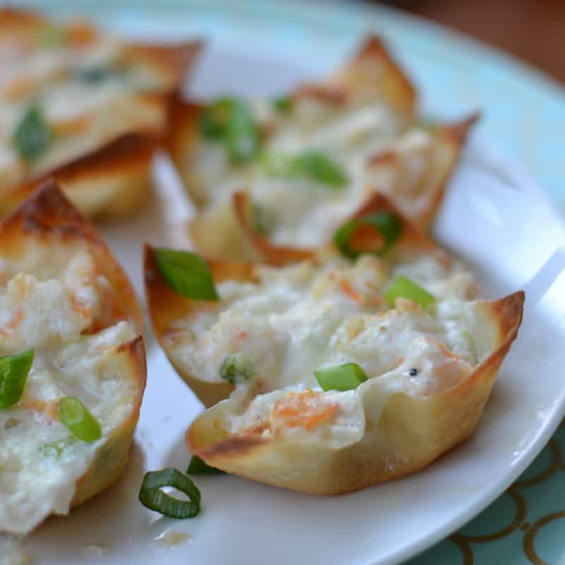 Cheesy shrimp dip baked in crispy wonton shells are a simple appetizer