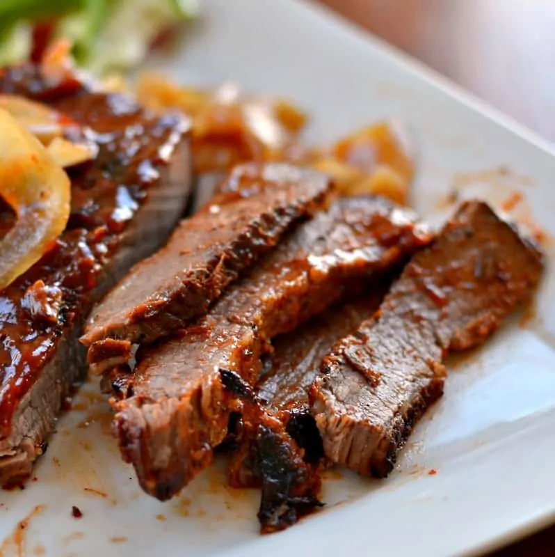 This super tender Oven Baked Barbecued Beef Brisket is coated with a dry rub made with ingredients commonly found in your pantry and slow-cooked to perfection