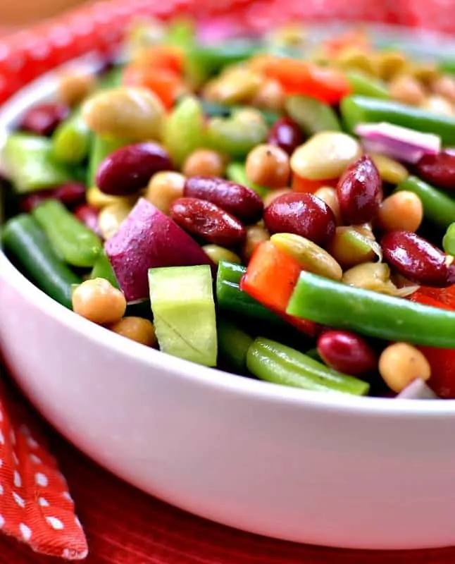 A quick and easy bean salad with a zesty sweet dressing that is perfect for all your spring and summer meals.