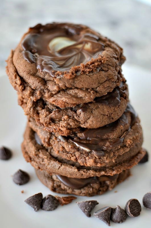 A stack of Andes cookies on a white plate. 