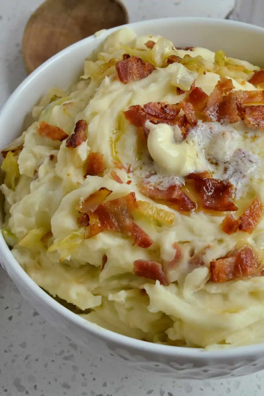 Traditional Irish Colcannon is a delectable combination of creamy mashed potatoes and pan-fried cabbage lightly seasoned with salt and black pepper. 
