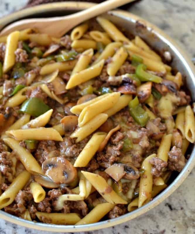 Philly Cheesesteak Pasta with ground beef, onions, peppers, mushrooms, and provolone cheese