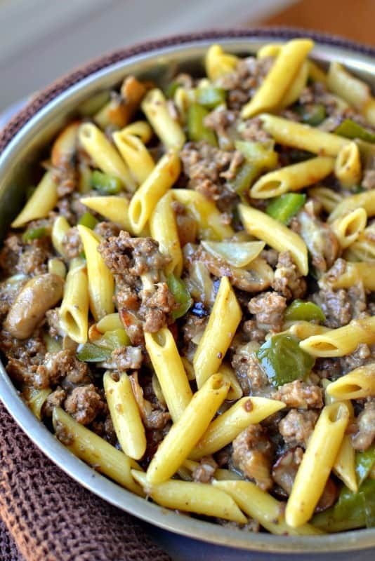 Creamy Philly Cheesesteak Pasta has ground beef, green peppers, mushrooms and provolone cheese