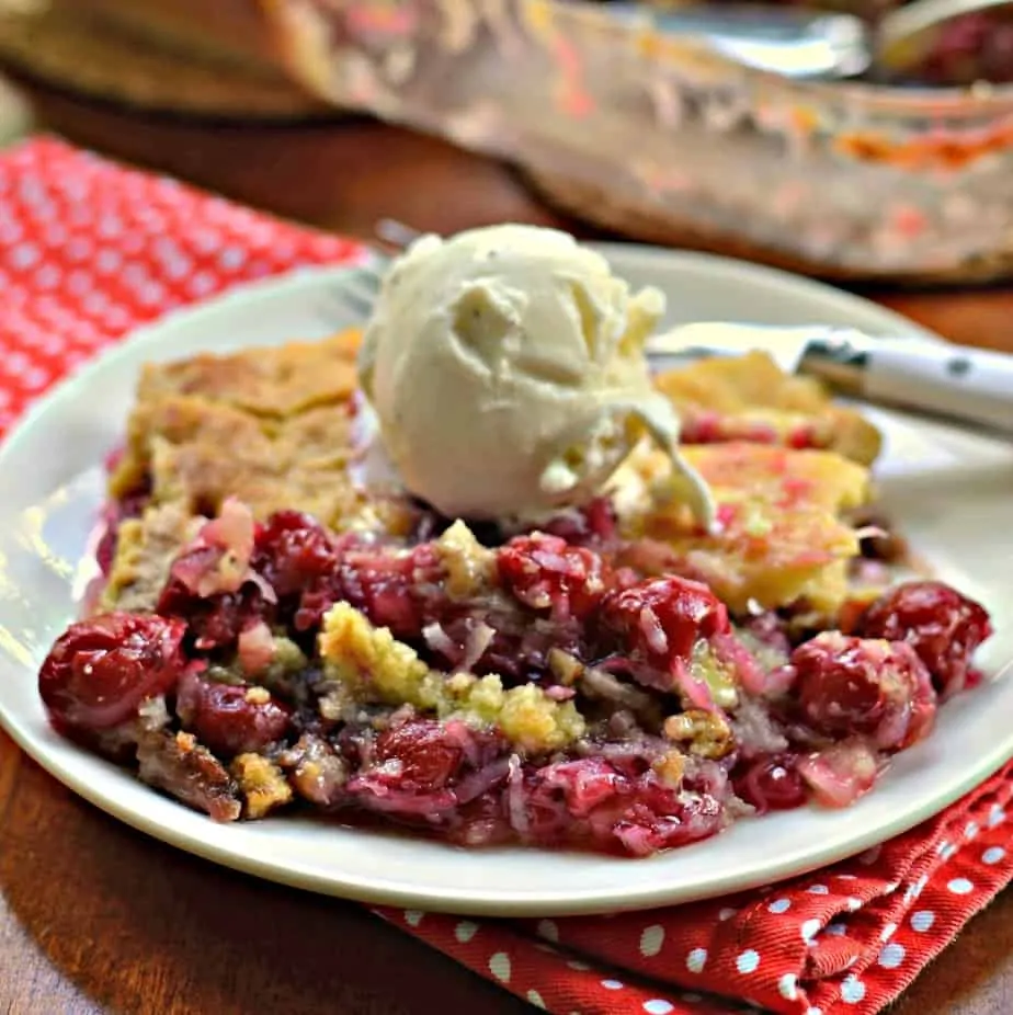 This family friendly Cherry Dump Cake takes less than ten minutes to get in the oven. 