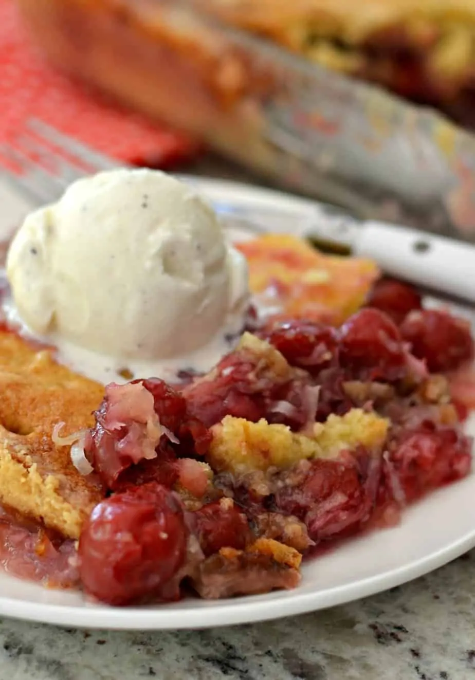 This family friendly scrumptious cherry dump cake has six easy ingredients comes together in less than ten minutes