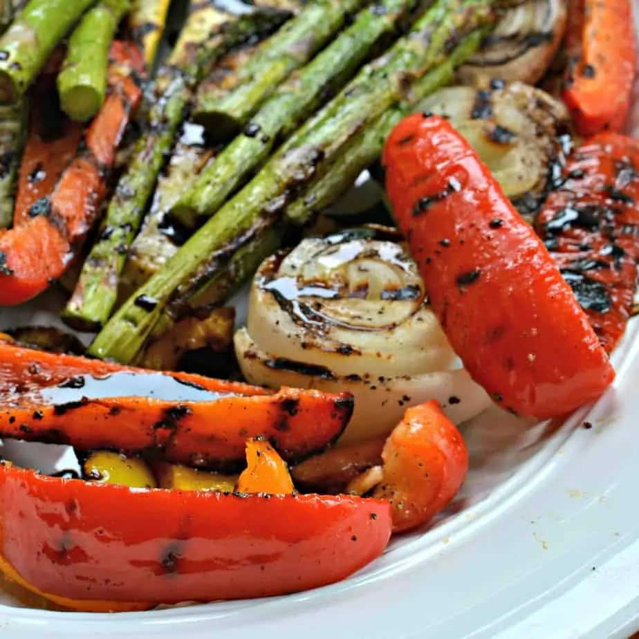 These Grilled Vegetables bring together bell peppers, zucchini, squash, onions and asparagus all grilled to perfection. 