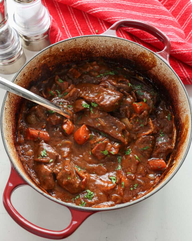 A Dutch oven full of beef bourguignon. 
