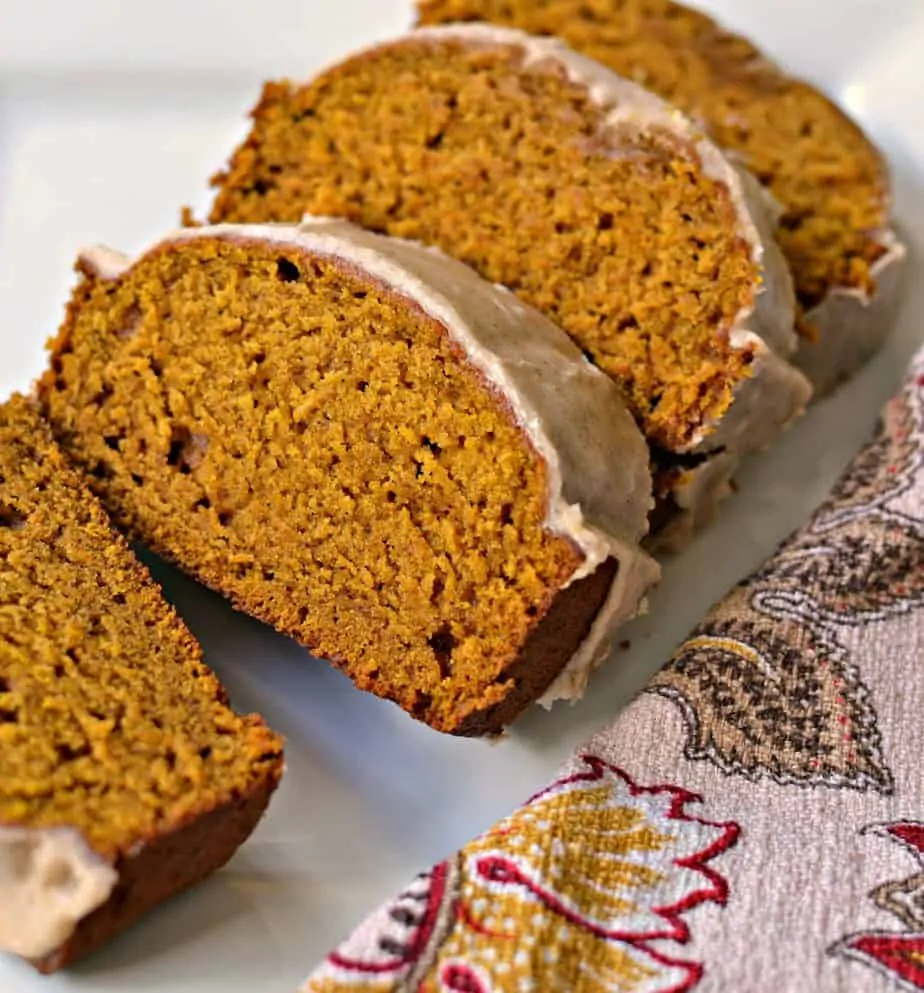 This moist Pumpkin Bread Recipe is covered with a sweet cinnamon glaze.