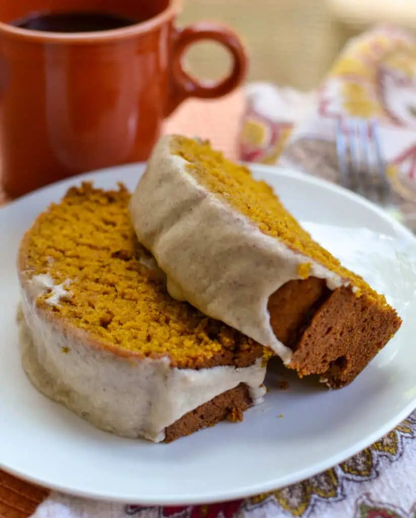 This easy delicious moist Pumpkin Bread Recipe is covered with a sweet cinnamon glaze. 