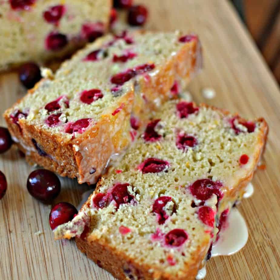 Deliciously warm and moist cranberry bread is packed with tart cranberries and coated with a sweet orange glaze