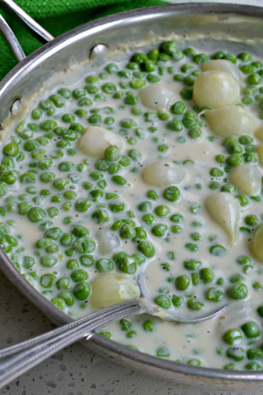 These sweet Creamed Peas with Pearl Onions combine peas and pearl onions into the creamiest classic quick side dish ever. 