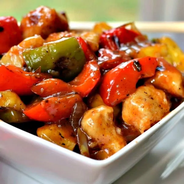 You can pull this crispy chicken with sweet and sour sauce together in about thirty minutes. 