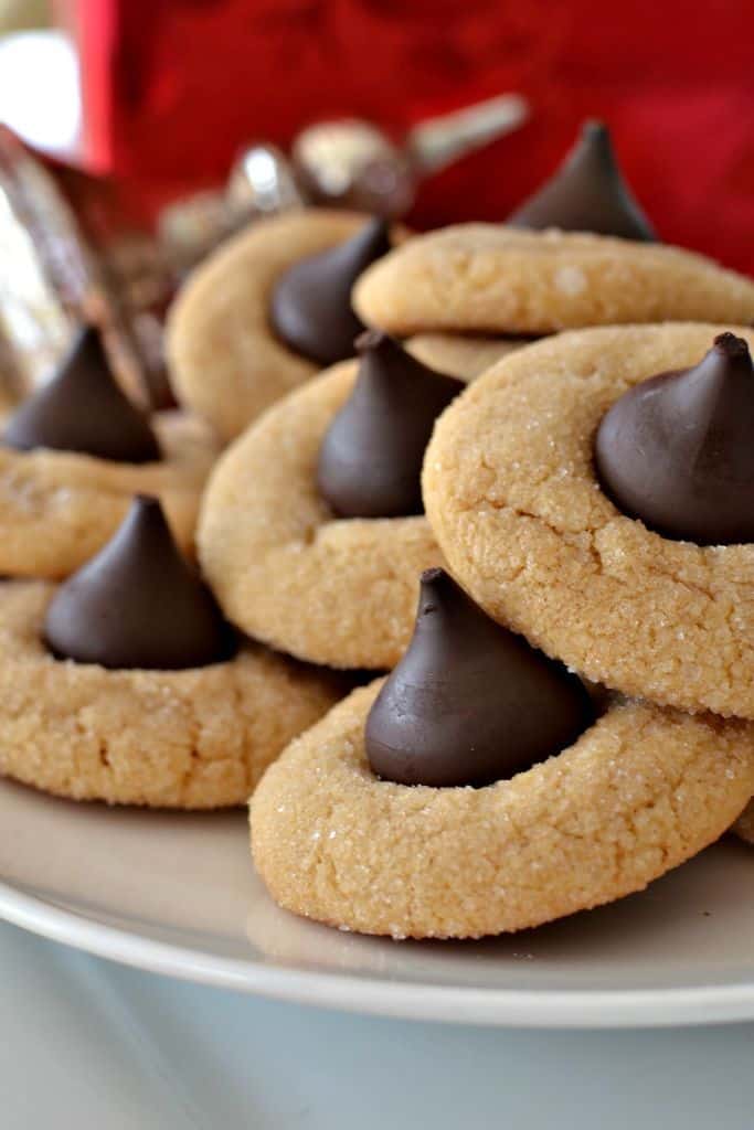 Peanut Butter Blossom Cookies are a favorite to include on Christmas cookie trays