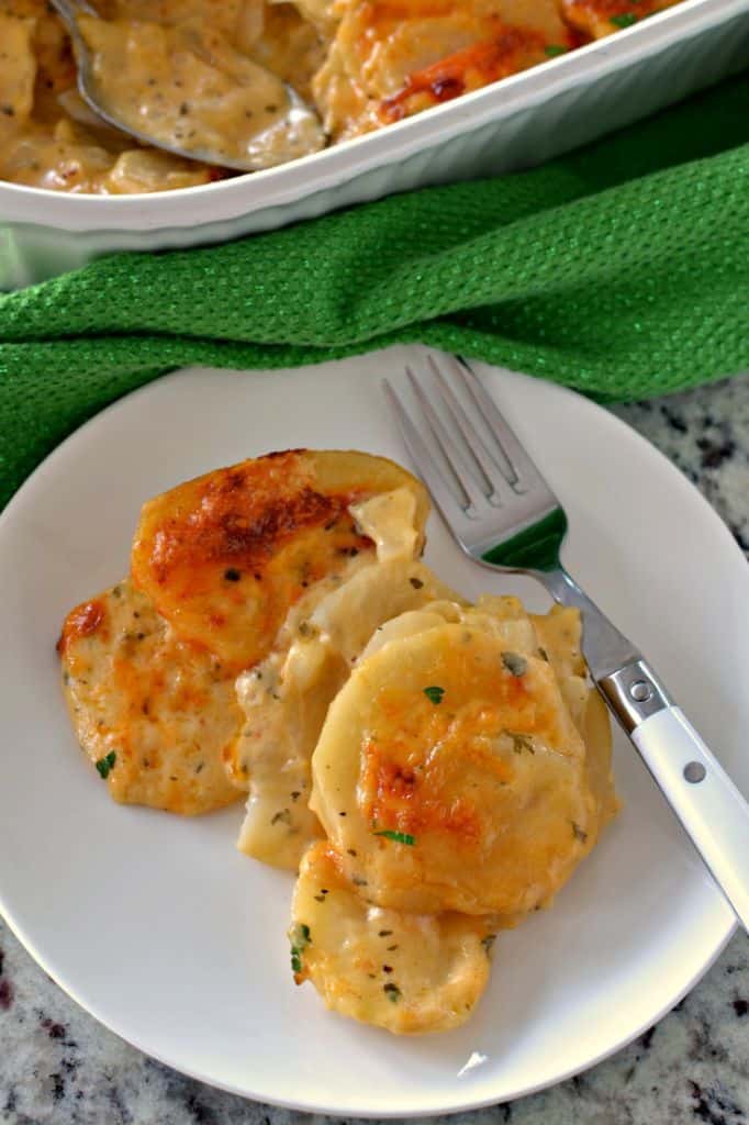 Cheesy Scalloped Potatoes are a perfect side dish for holiday meals, potlucks, and more