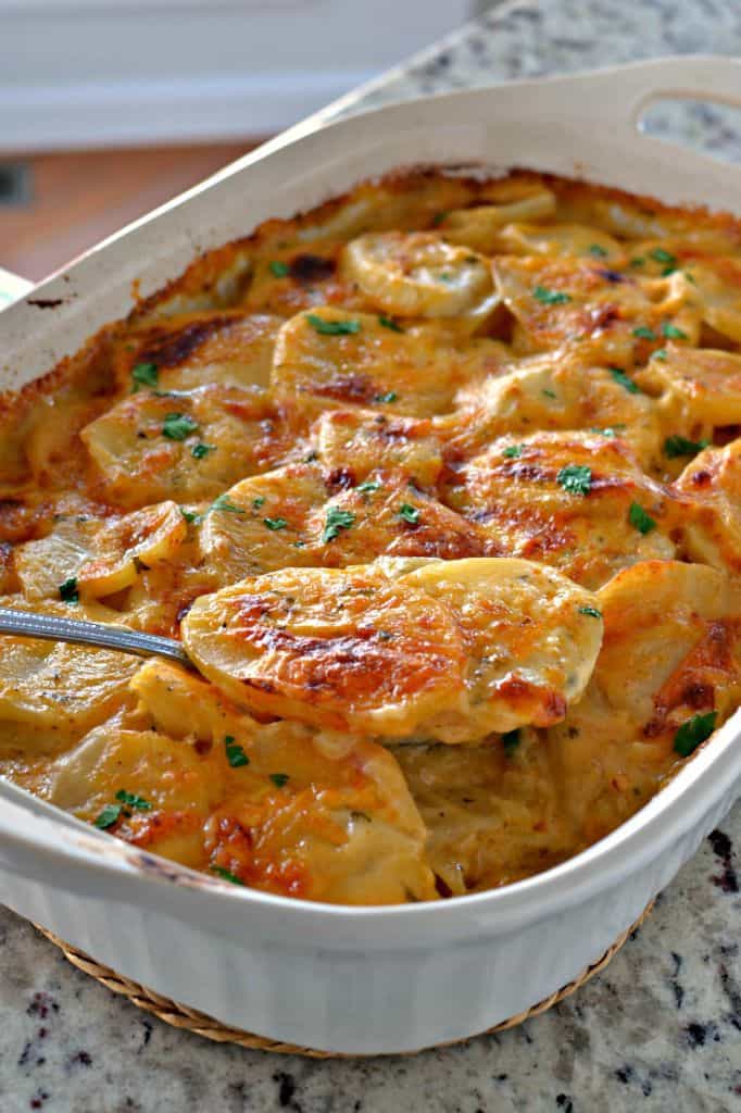 These creamy, cheesy scalloped potatoes are the perfect potato casserole to serve with dinner