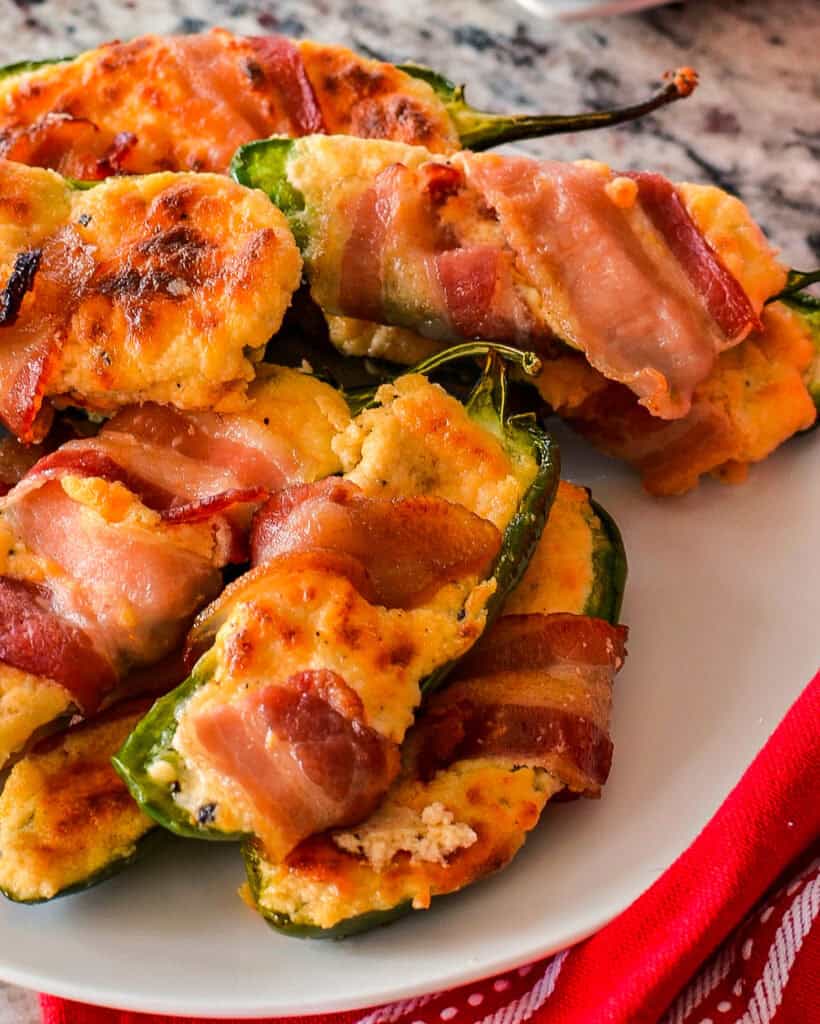 Plated bacon-wrapped jalapenos.