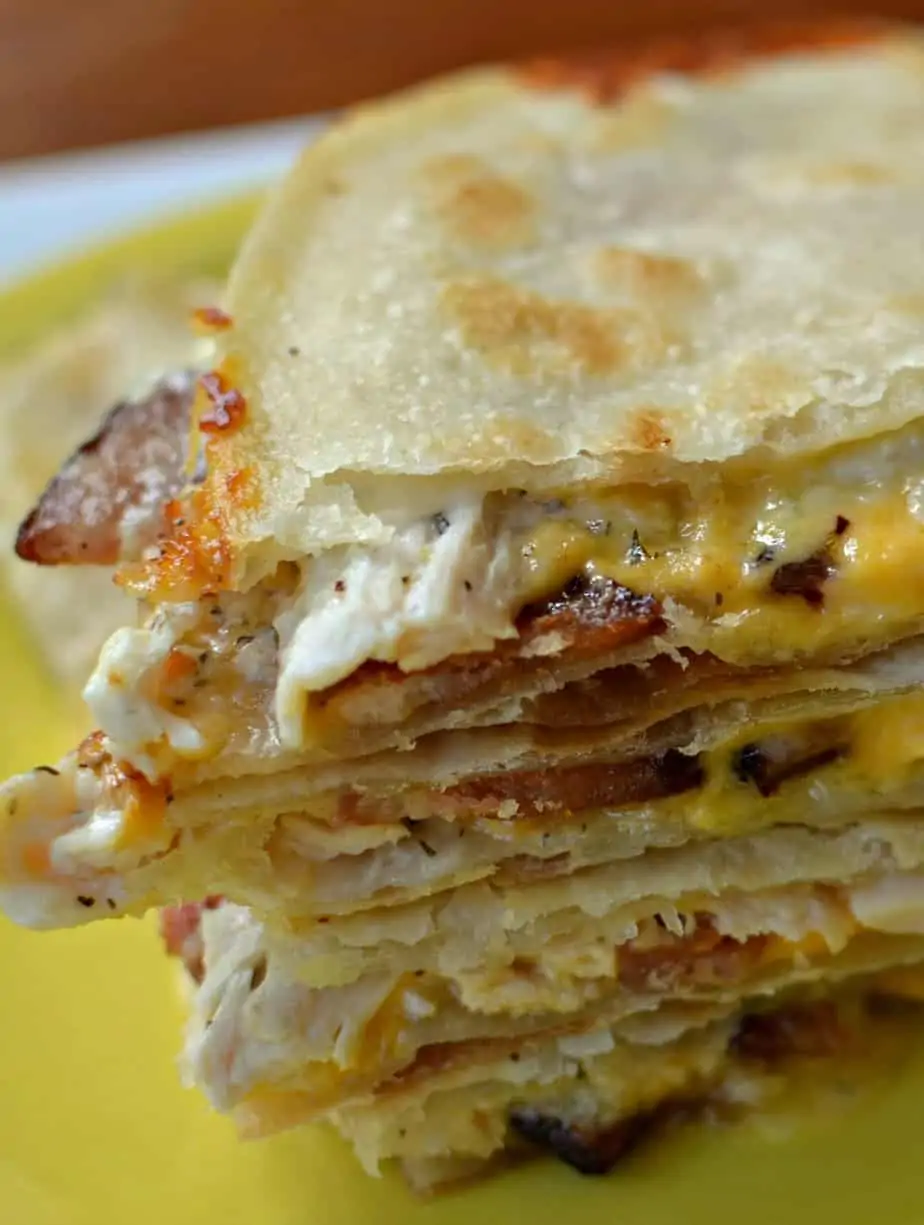 Rotisserie chicken, bacon, ranch and Colby Jack come together to make an incredibly tasty and easy Chicken Quesadilla!