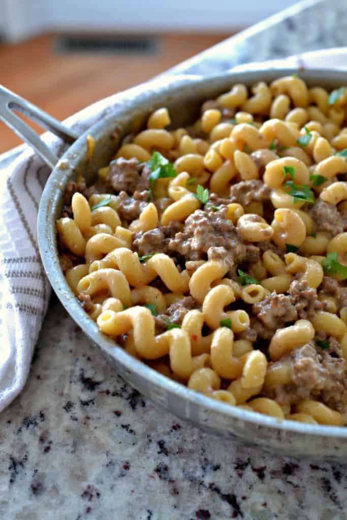 This Cheesy Homemade Hamburger Helper is made with ground beef, tender pasta, and a delicious mix of cheese and spices