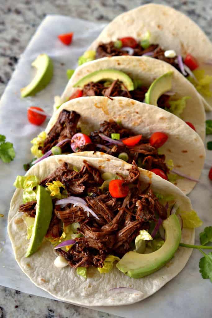 Tacos Barbacoa are a delicious, easy slow cooker dinner recipe that spices up taco night