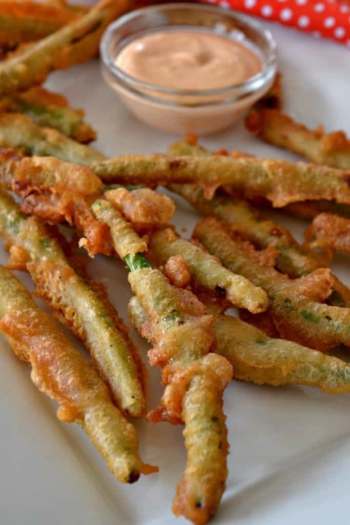 These Crispy Fried Green Beans with Sriracha Mayo are a cinch to whip up making them perfect for game day and movie night. 