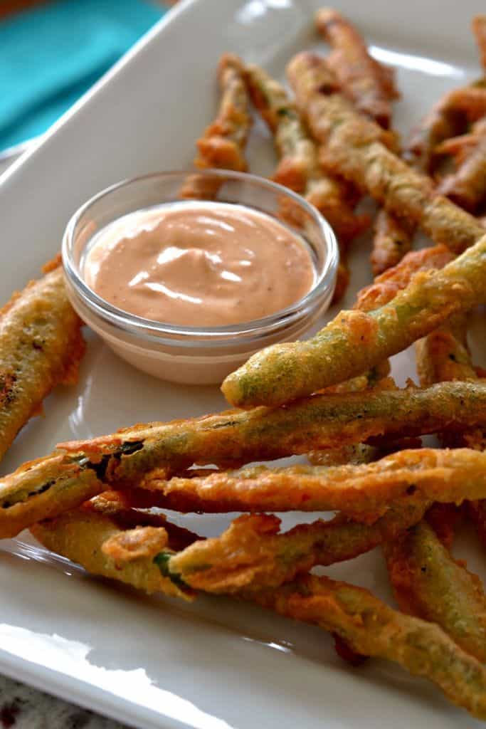 Crispy Fried Green Beans are dipped in my easy beer batter and then flashed fried to golden perfection. 